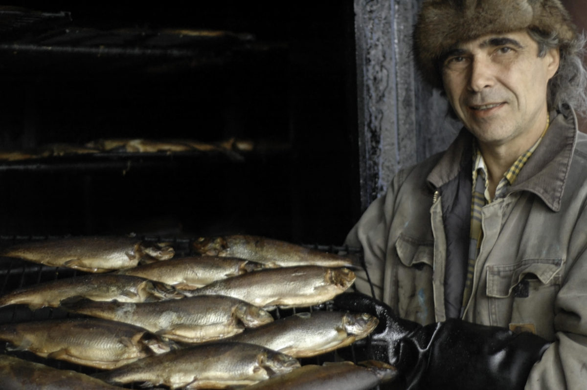 Man and smoked trout