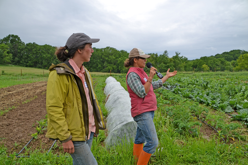 Two women farmers are presenting during a field day at their farm