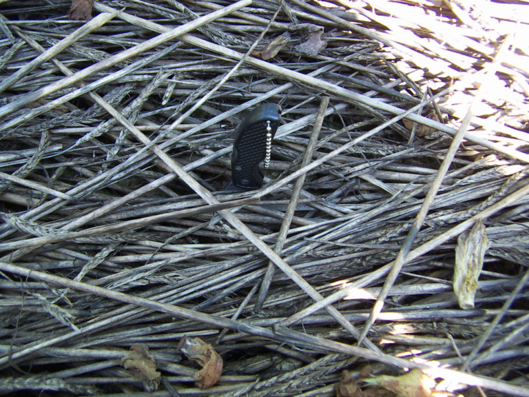 Figure 3.4 A small tool placed in light hay