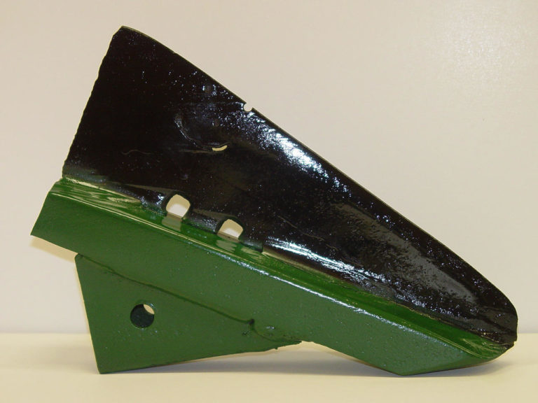 Figure 9.12 A green and black agricultural tool