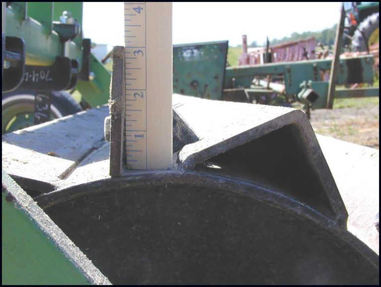 A ruler measuring three inches of metal