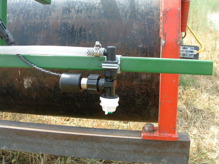 Green and black tools put together to make a spout