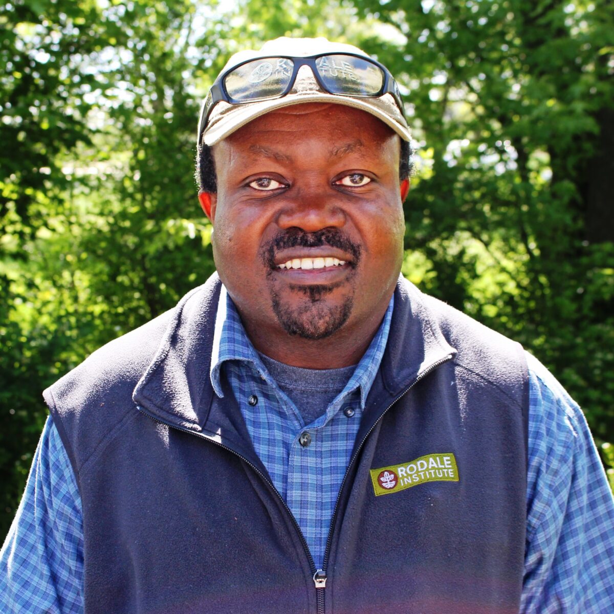 Headshot of a person in a blue fest from Rodale Institute