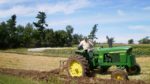 Man on tractor