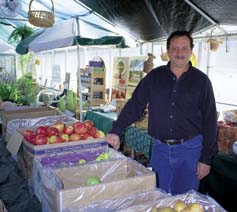 Tony Norris raises greens, herbs and tomatoes, but can offer a wider variety of Connecticut-grown crops thanks to a co-selling arrangement with a statewide organic growers cooperative he helped found with a SARE grant.