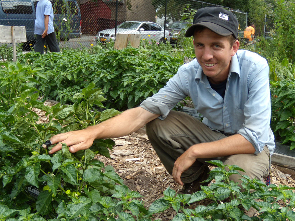 Man pointing to plants 