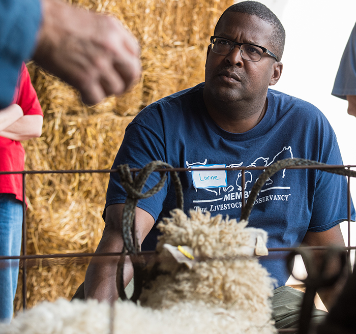 farmer listening at a workshop