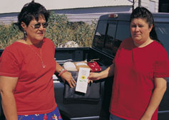 two farmers at farmer's market