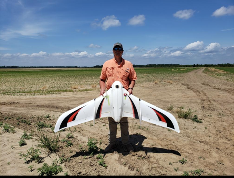 Person holding drone