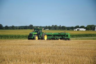 A tractor passing through a field